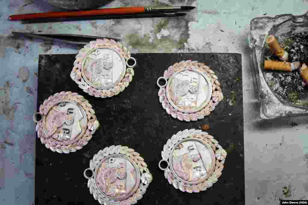 Hrayr Dserounian, who said he feels the jewelry industry has lost some of its creativity, shows off some of the pieces being made in his workshop, in Beirut, Lebanon, April 1, 2016.