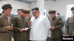 North Korean leader Kim Jong Un gives field guidance during his visit to a machine factory under the Ranam Coal Mining Machine Complex in this undated photo released by North Korea's Korean Central News Agency in Pyongyang, July 17, 2018. Meanwhile, North Korea's denuclearization efforts have stalled.