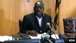 Minister Sibusiso Moyo Zimbabwe's Foreign Affairs – speaking to reporters Harare (08/12/2018) - laments the move by President Donald Trump to sign the Zimbabwe Democracy and Economic Recovery Amendment Act of 2018, last week. (C. Mavhunga/VOA)