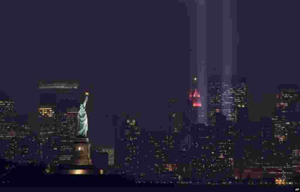 The "Tribute in Light" marks the September 11 Anniversary in New York taken from Bayonne, N.J. on Tuesday, Sept. 11, 2007. (AP Photo/Tim Larsen)