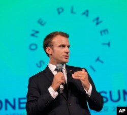 French President Emmanuel Macron speaks during the One Planet Summit in New York, Sept. 26, 2018.