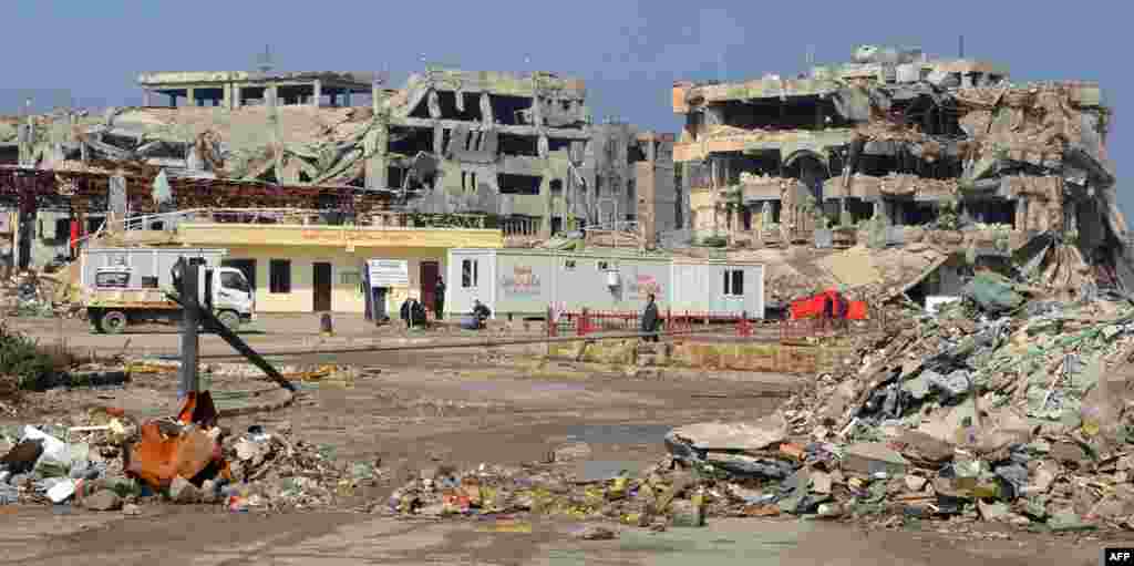 Destruction in the northern Iraqi city of Mosul. Iraq received pledges totaling $30 billion at an international conference for reconstruction of the war-torn country, the host Kuwait announced.