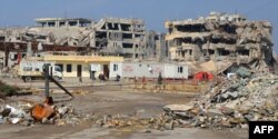 FILE - A general view taken on Feb. 14, 2018 shows destruction in the northern Iraqi city of Mosul.