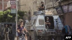 Des soldats dans le nord du Sinaï, en Egypte, le 26 juillet 2018. (AFP PHOTO / Khaled DESOUKI)