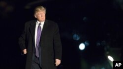 FILE - President Donald Trump walks on the South Lawn upon arrival at the White House in Washington from a trip to Florida, Feb. 12, 2017. Lawyers say trademarks present conflicts of interest for Trump and may violate the emoluments clause of the U.S. Constitution.