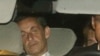 Antigo presidente francês Nicolas Sarkozy chega em carro policial a unidade de investigação financeira para ser apresentado ao juiz (Jullho 2014)