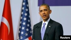 U.S. President Barack Obama addresses a news conference following a working session at the Group of 20 (G20) leaders summit in the Mediterranean resort city of Antalya, Turkey, Nov. 16, 2015. 