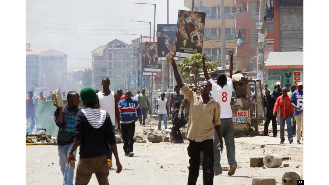 Opposition supporters clash with police in the Jacaranda grounds quarter in Nairobi, Kenya, Nov. 28, 2017.