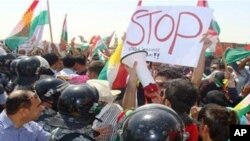 Iraqi Kurds protest Turkish, Iranian air strikes and shelling of Iraqi Kurdistan border areas on Wednesday, Aug. 24, 2011.