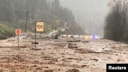 A view of a road near Popkum following mudslides and flooding in British Columbia, Canada November 14, 2021, in this picture obtained from social media on Nov. 15, 2021. 