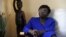 FILE - Victoire Ingabire Umuhoza poses at her home, April 7, 2010, in Kigali, Rwanda.