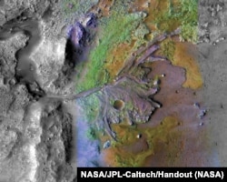 In this file photo, formations made by water and sediment are seen in the Jezero Crater on Mars. ( NASA/JPL-Caltech/Handout)