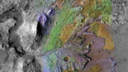 FILE: Formations made by water and sediment are seen in the Jezero Crater on Mars, a possible landing site for the Mars 2020 Rover, in this false color image taken by NASA, published May 15, 2019 and obtained November 15, 2019. NASA/JPL-Caltech/Handout
