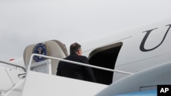 FILE - U.S. Secretary of State Mike Pompeo enters his plane to depart on a trip, at Andrews Air Force Base, Maryland, Oct. 15, 2018.