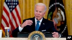 President Joe Biden speaks in the East Room of the White House in Washington, Jan. 24, 2022.