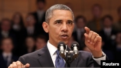 U.S. President Barack Obama speaks to guests at the Waterfront Hall in Belfast, June 17, 2013. 