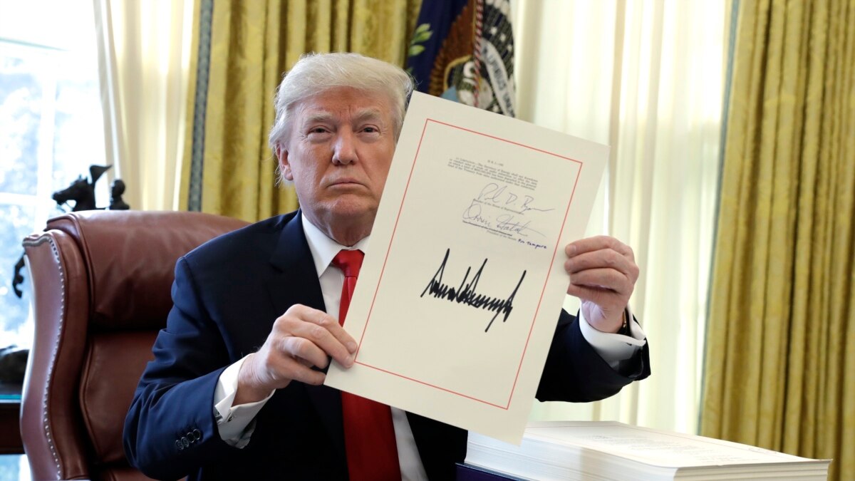 Triumphant Trump Signs Landmark Tax Bill as He Leaves for Holidays