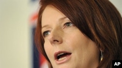 Australia's new prime minister Julia Gillard speaks during a press conference, in Canberra, 24 Jun 2010