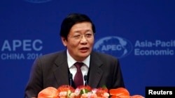 Chinese Finance Minister Lou Jiwei makes a speech at the APEC finance ministers meeting opening ceremony in Beijing, Oct. 22, 2014.