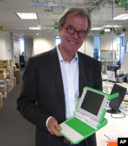 Nicholas Negroponte hopes to place a laptop in the hands of every child on the planet.