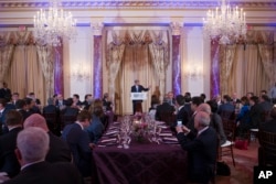 Secretary of State John Kerry makes remarks at the top of a State Department dinner for Nuclear Security Summit delegation guests, in Washington, Thursday, March 31, 2016.