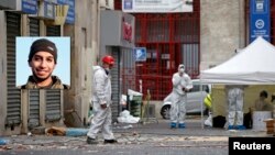 A l'extérieur de l'immeuble de Saint-Denis où l'assaut s'est déroulé, le 19 novembre 2015. (REUTERS/Benoit Tessier)