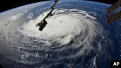 Photo provided by NASA shows Hurricane Florence from the International Space Station on Sept. 10, 2018, as it threatens the U.S. East Coast.