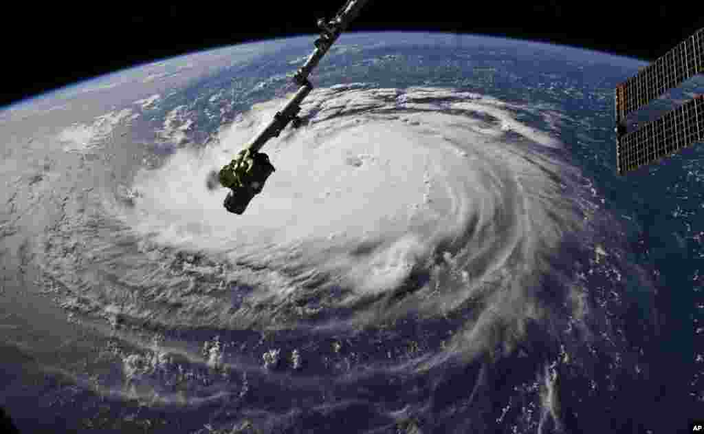 Photo provided by NASA shows Hurricane Florence from the International Space Station as it threatens the U.S. East Coast.