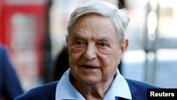 FILE - Business magnate George Soros arrives to speak at the Open Russia Club in London, Britain, June 20, 2016. 