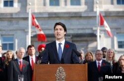 FILE - Canadian Prime Minister Justin Trudeau speaks to the crowds in Ottawa, Nov. 4, 2015.