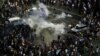 Police Fire Tear Gas as Romanians Rally Against Government