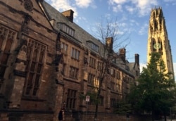 FILE - Harkness Tower on the campus of Yale University in New Haven, Conn., Sept. 9, 2016 photo. The Biden Justice Department says it is dismissing its discrimination lawsuit against Yale University.