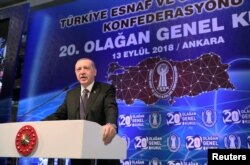 Turkish President Recep Tayyip Erdogan makes a speech during a meeting in Ankara, Turkey, Sept. 13, 2018.