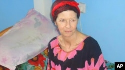 British hostage Judith Tebbutt, is pictured at a house in Adado, central Somalia, before her departure, March 21, 2012. 