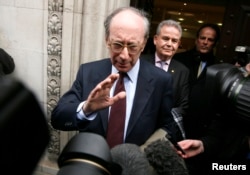 Malcolm Rifkind leaves the Intelligence and Security Committee in London, Feb. 24, 2015.