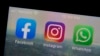This Tuesday, Oct. 5, 2021 file photo shows the mobile phone app logos for, from left, Facebook, Instagram and WhatsApp in New York. (AP Photo/Richard Drew, File)