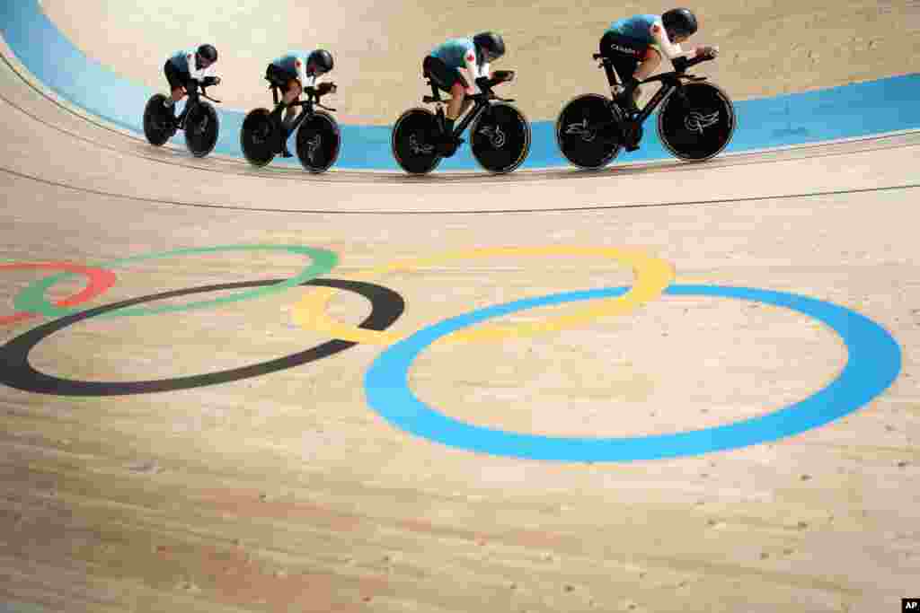 Team Canada competes during the track cycling women&#39;s team pursuit at the 2020 Summer Olympics in Izu, Japan.