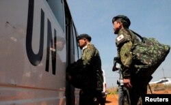 FILE - Japanese peacekeepers arrive at the Juba airport to participate in the United Nations Mission in South Sudan in South Sudan's capital Juba, Nov. 21, 2016.