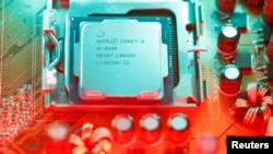 Intel's 8th generation Core i5 processor is seen on the computer's motherboard in this illustration taken Jan. 5, 2018.
