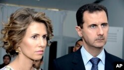 Perezida Bashar al-Assad n’umugore wiwe Asma 