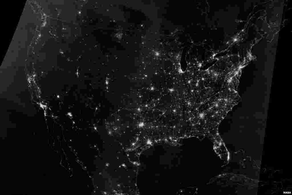 The Visible Infrared Imaging Radiometer Suite (VIIRS) on the Suomi NPP (National Polar-orbiting Partnership) satellite acquired two nighttime images for this natural-light, mosaic view of the continental United States. (NASA Earth Observatory image by Jesse Allen and Robert Simmon)