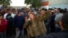 Migrantes evalúan entre quedarse o regresar tras choque en Tijuana