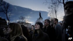 People gather on Paris' Place de la Republique, Sunday, April 10, 2016. Police on Monday dispersed protesters who had been holding night-time demonstrations since last week over a proposed labor law and social conditions in France.