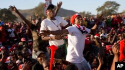 Opposition party supporters cheer opposition challenger Nelson Chamisa at a campaign rally in Bindura, Zimbabwe, July 27, 2018. 