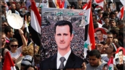 هواداران اسد در دمشق. ۲۶ اکتبر ۲۰۱۱
