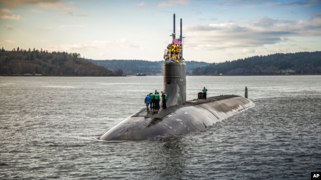 FILE - The Seawolf-class fast-attack submarine USS Connecticut departs Puget Sound Naval Shipyard in this Dec. 15, 2016, photo, provided by the U.S. Navy.