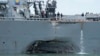 Remains from US Destroyer Recovered; Search For Missing Sailors Continues 