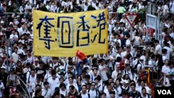 香港民陣估計103萬人參與6-9反送中大遊行，主權移交後最大規模。（美國之音湯惠芸攝）