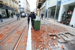 Police officers secure the area after an earthquake, in Zagreb, Croatia December 29, 2020. REUTERS/Antonio Bronic