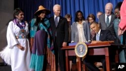 President Barack Obama signs Violence Against Women Act, Interior Department, Washington, March 7, 2013.